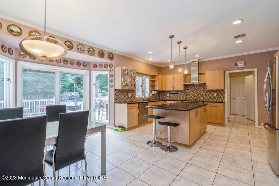 30 Chagall Road Marlboro, NJ 07746 - Photo 10 of 26 a kitchen with granite countertop a sink cabinets and window