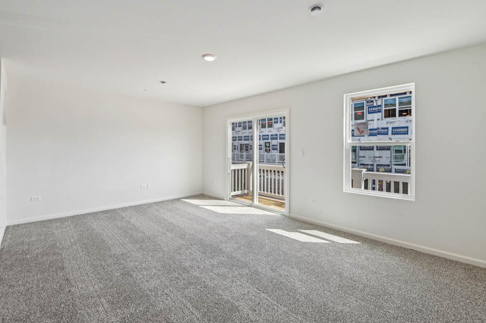 17305 Ulster Drive Tinley Park, IL 60477 - Photo 11 of 25 a view of an empty room with a window