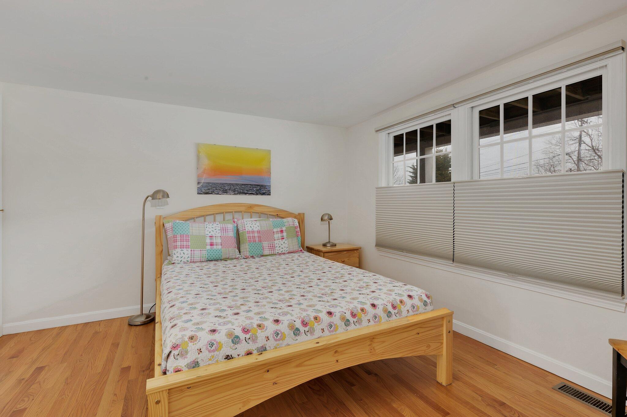 6 Shore Road, Unit 26 Truro, MA 02666 - Photo 17 of 25 a bedroom with a bed and window