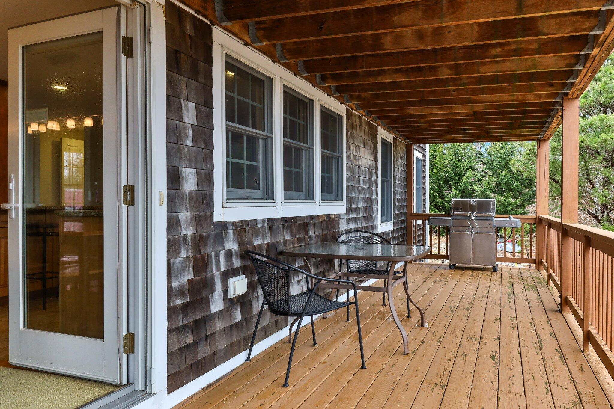 6 Shore Road, Unit 26 Truro, MA 02666 - Photo 24 of 25 a view of a balcony with chairs