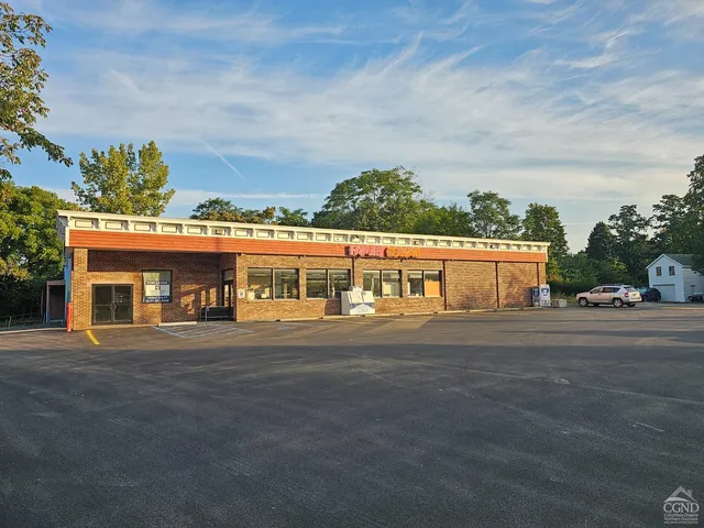 front view of a house with a street
