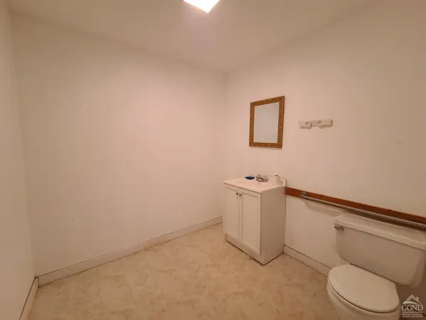 a bathroom with a toilet