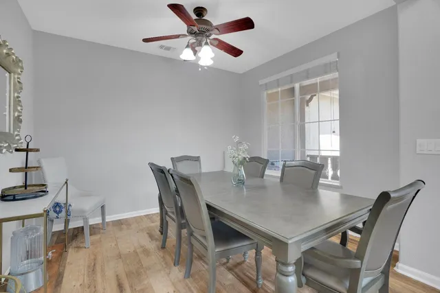 a view of a dining room with furniture