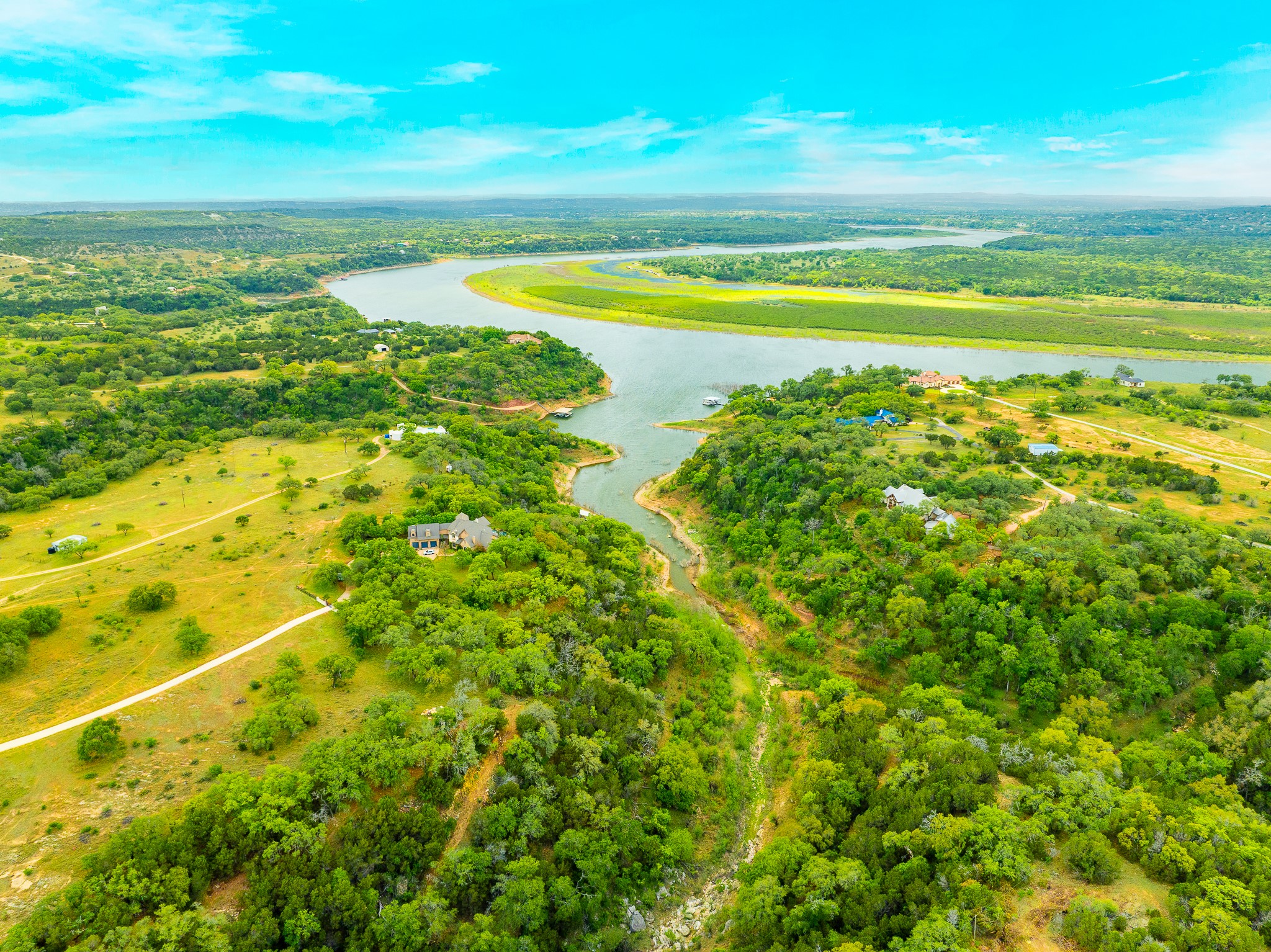 28205 Turner Ranch Road Marble Falls, TX 78654 - Photo 2 of 39 a view of an ocean and beach