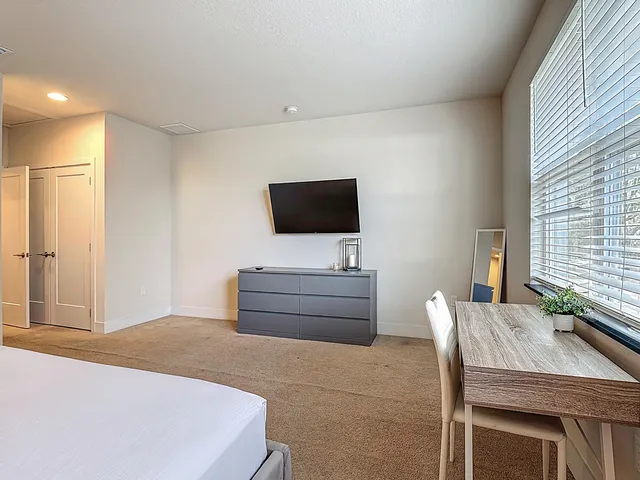 a bathroom with a shower and toilet