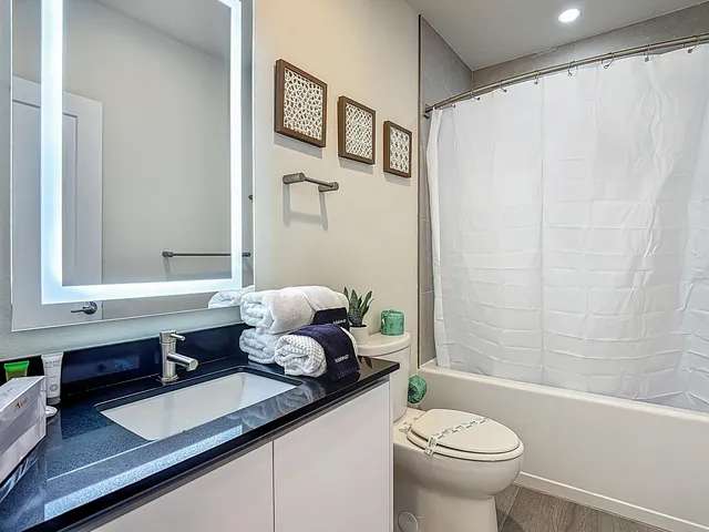 a view of a chairs and table in the patio