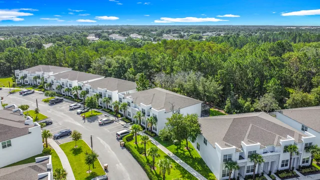 an aerial view of a house with a garden