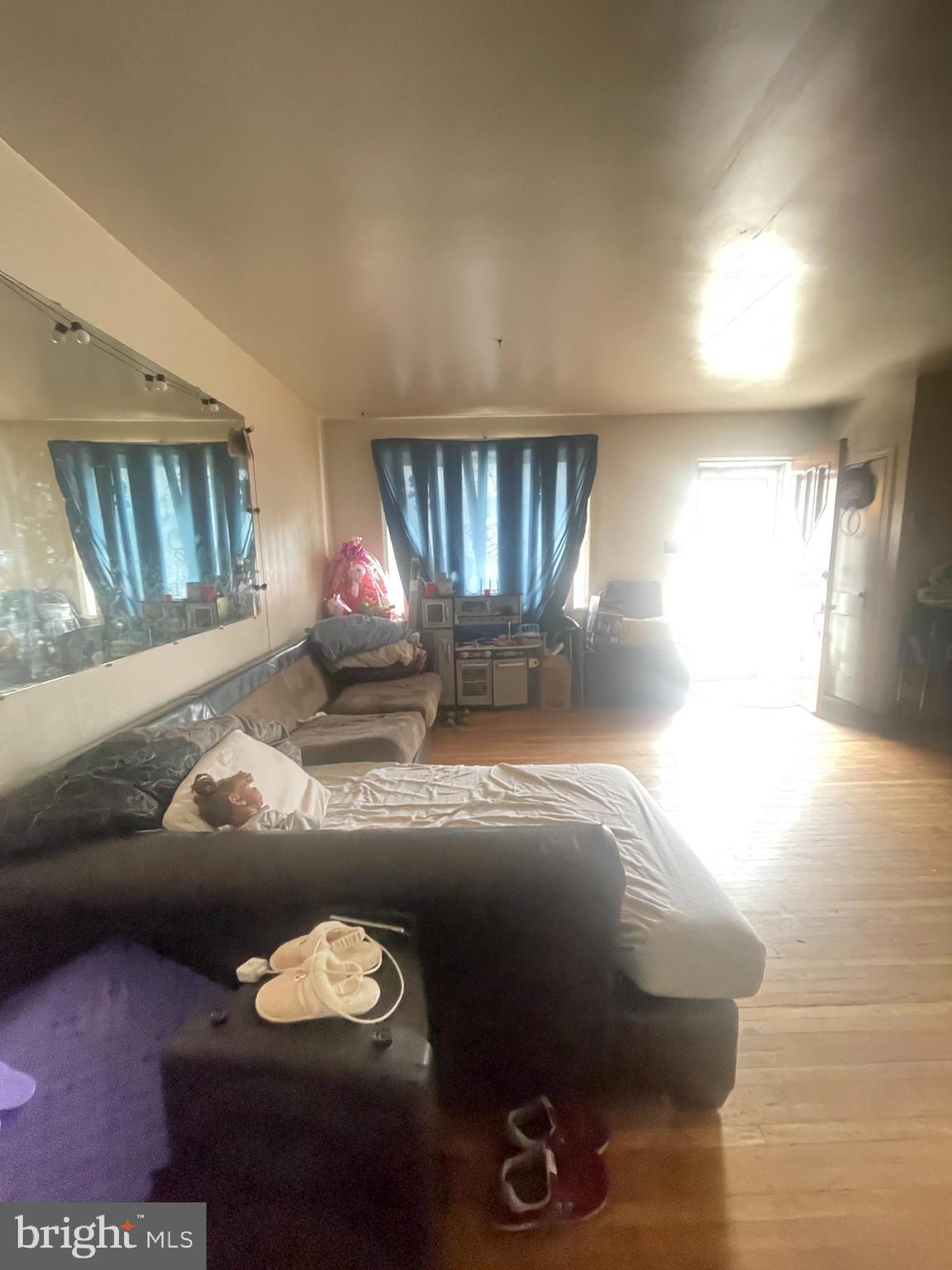 890 Carver Street Philadelphia, PA 19124 - Photo 4 of 11 a living room with furniture and a rug