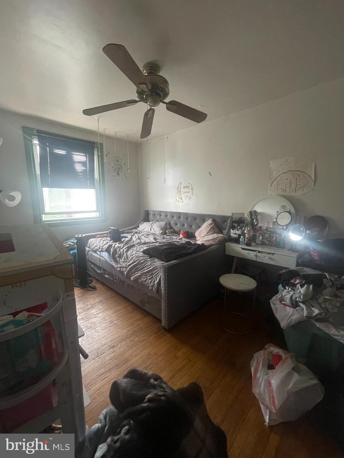 890 Carver Street Philadelphia, PA 19124 - Photo 7 of 11 a bedroom with furniture and a window