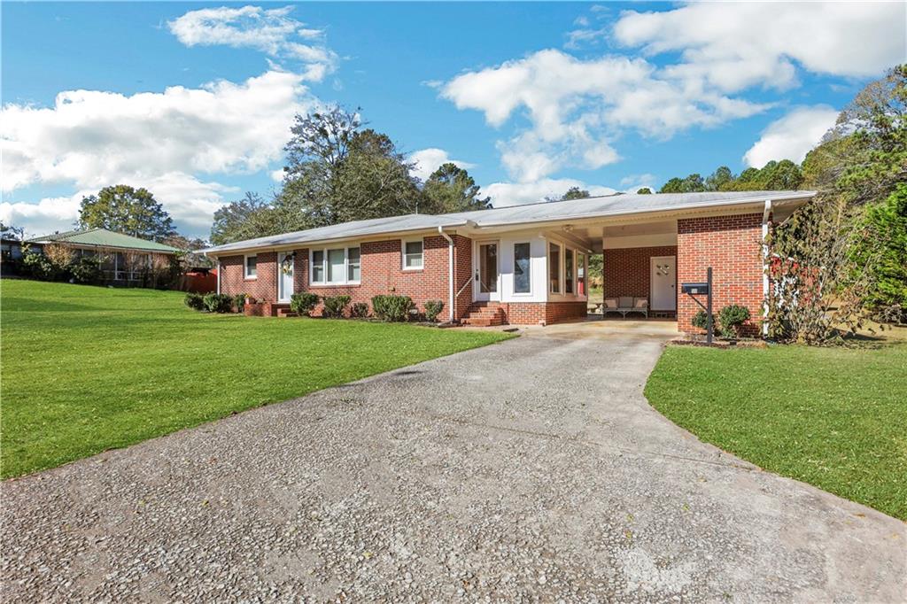 511 Harry McCarty Road Bethlehem, GA 30620 - Photo 1 of 1 front view of a house with a yard