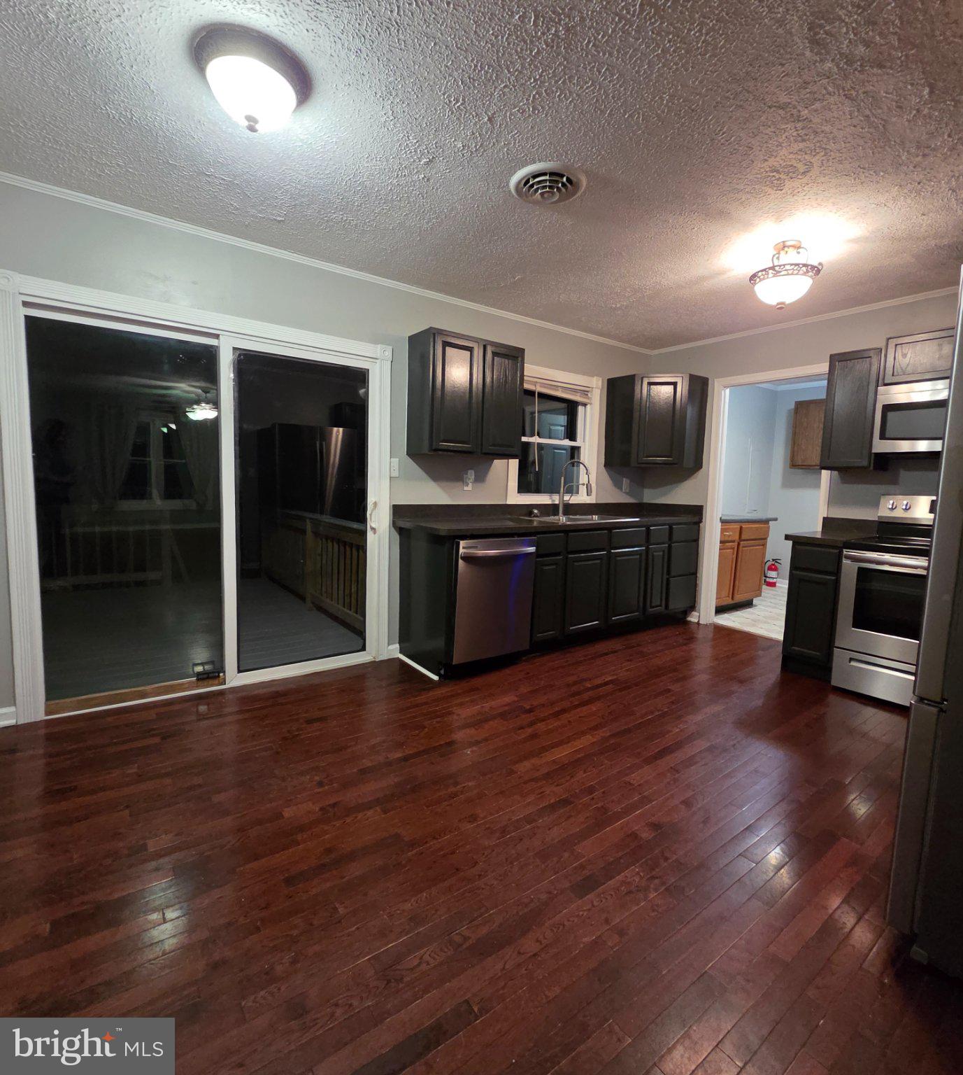 178 Payne Road Winchester, VA 22603 - Photo 45 of 101 kitchen/ sliding drs to 10x12 deck