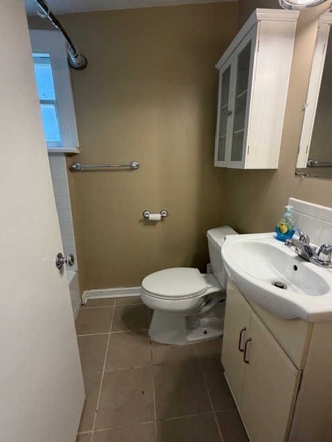 5938 Dunham Road Downers Grove, IL 60516 - Photo 12 of 15 a bathroom with a sink toilet and a mirror