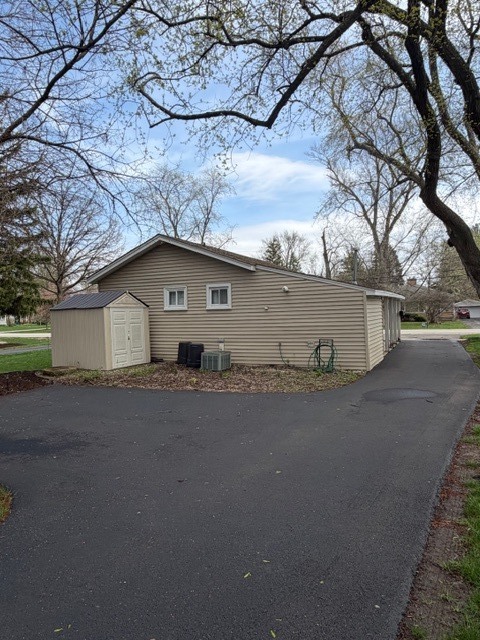 5938 Dunham Road Downers Grove, IL 60516 - Photo 2 of 15 a house view with a street