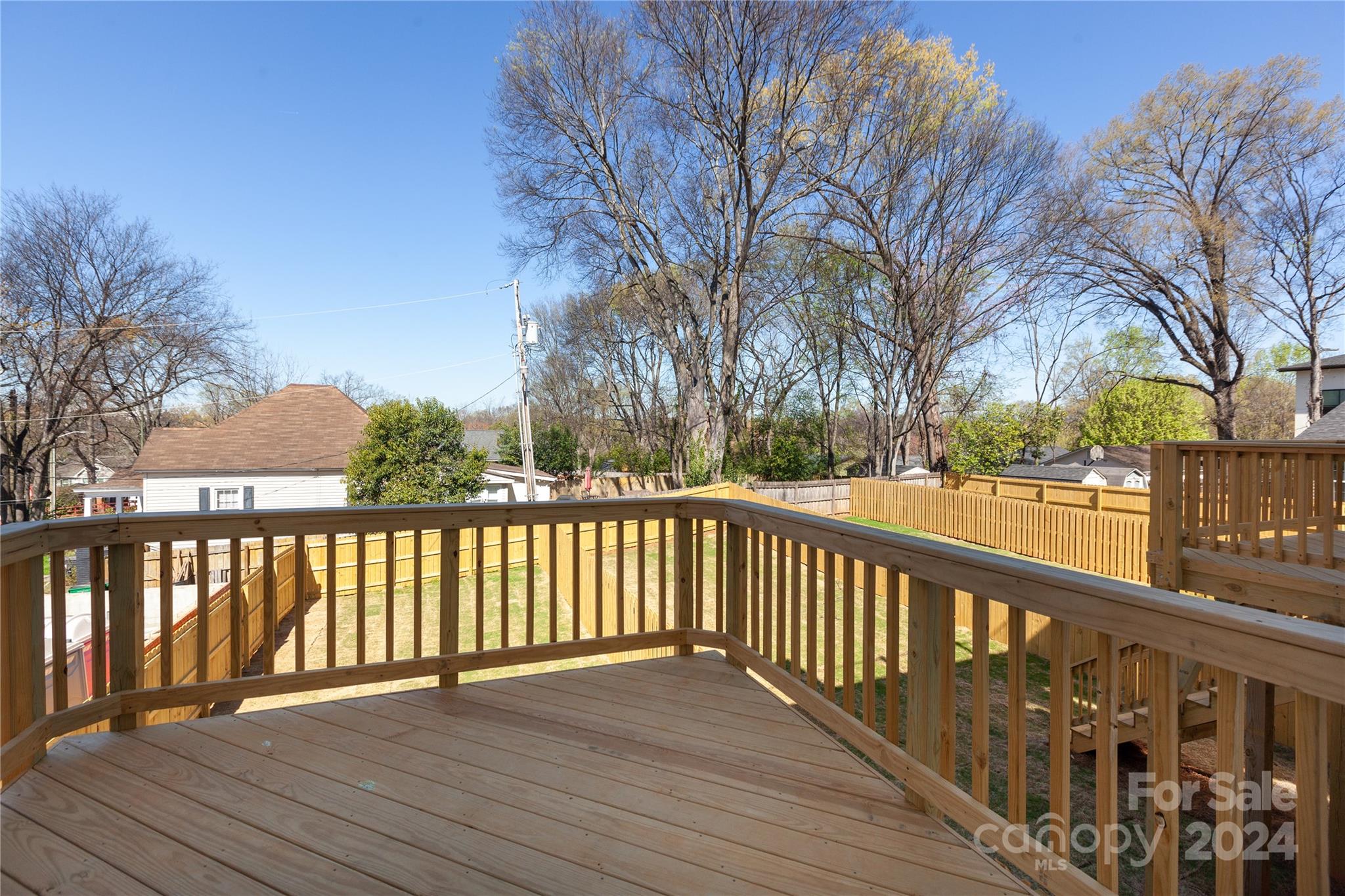 1405 Seigle Avenue Charlotte, NC 28205 - Photo 13 of 35 a view of wooden deck with a trees