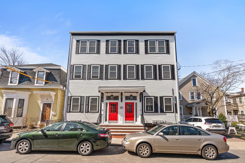 17-19 Spring Garden Street Boston, MA 02125 - Photo 1 of 24 a car parked in front of a building