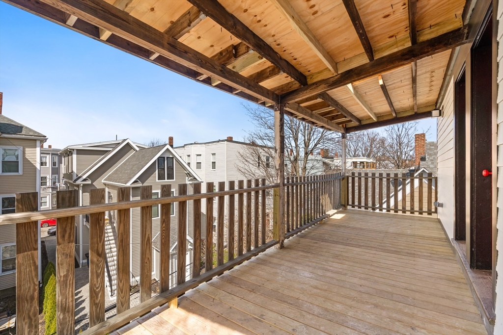 17-19 Spring Garden Street Boston, MA 02125 - Photo 17 of 24 a view of a wooden deck