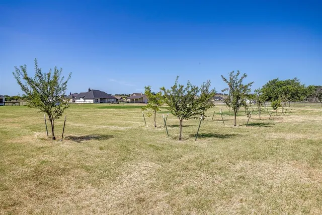 a view of swimming pool with outdoor seating
