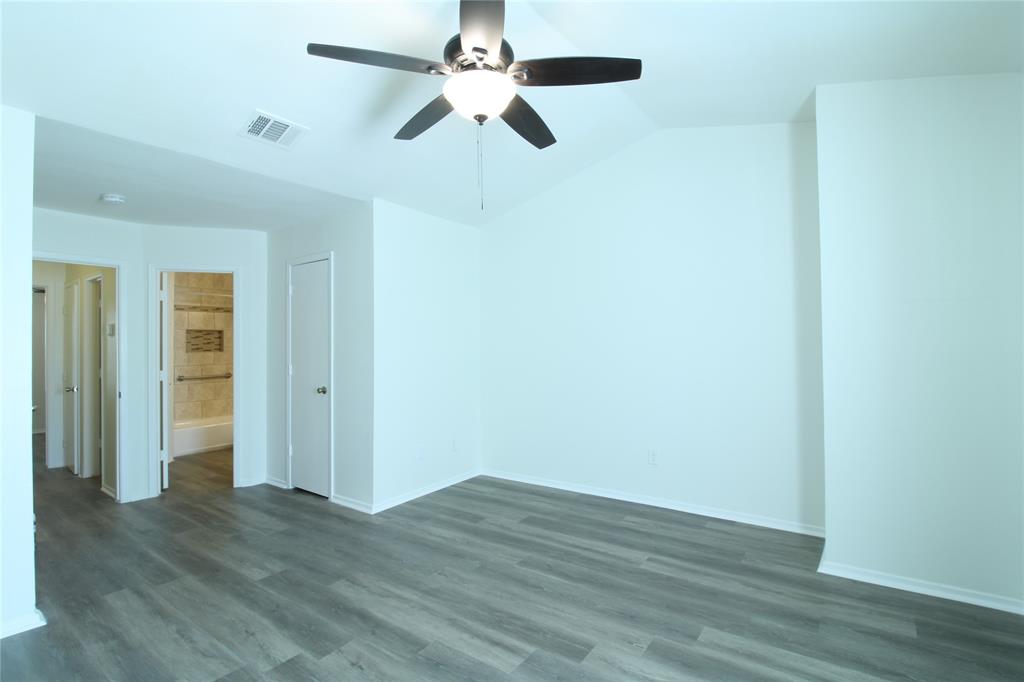 605 Carriagehouse Lane, Unit B2 Garland, TX 75040 - Photo 6 of 11 wooden floor in an empty room