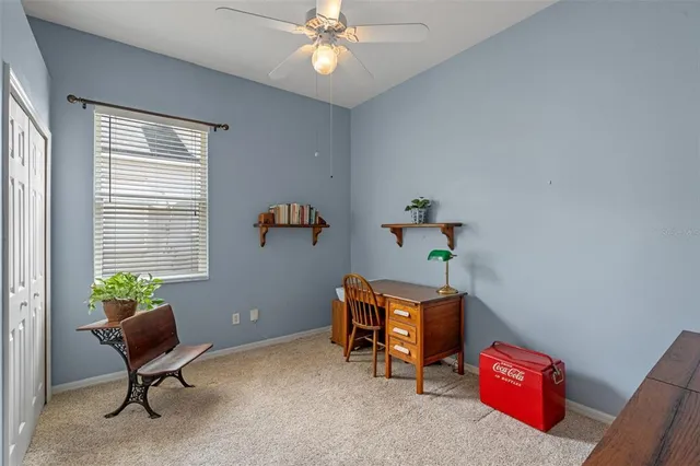 a room with furniture and a window
