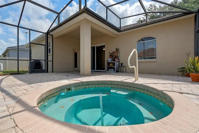 a view of outdoor space swimming pool and outdoor seating