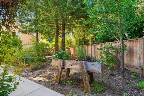 a garden view with a seating space