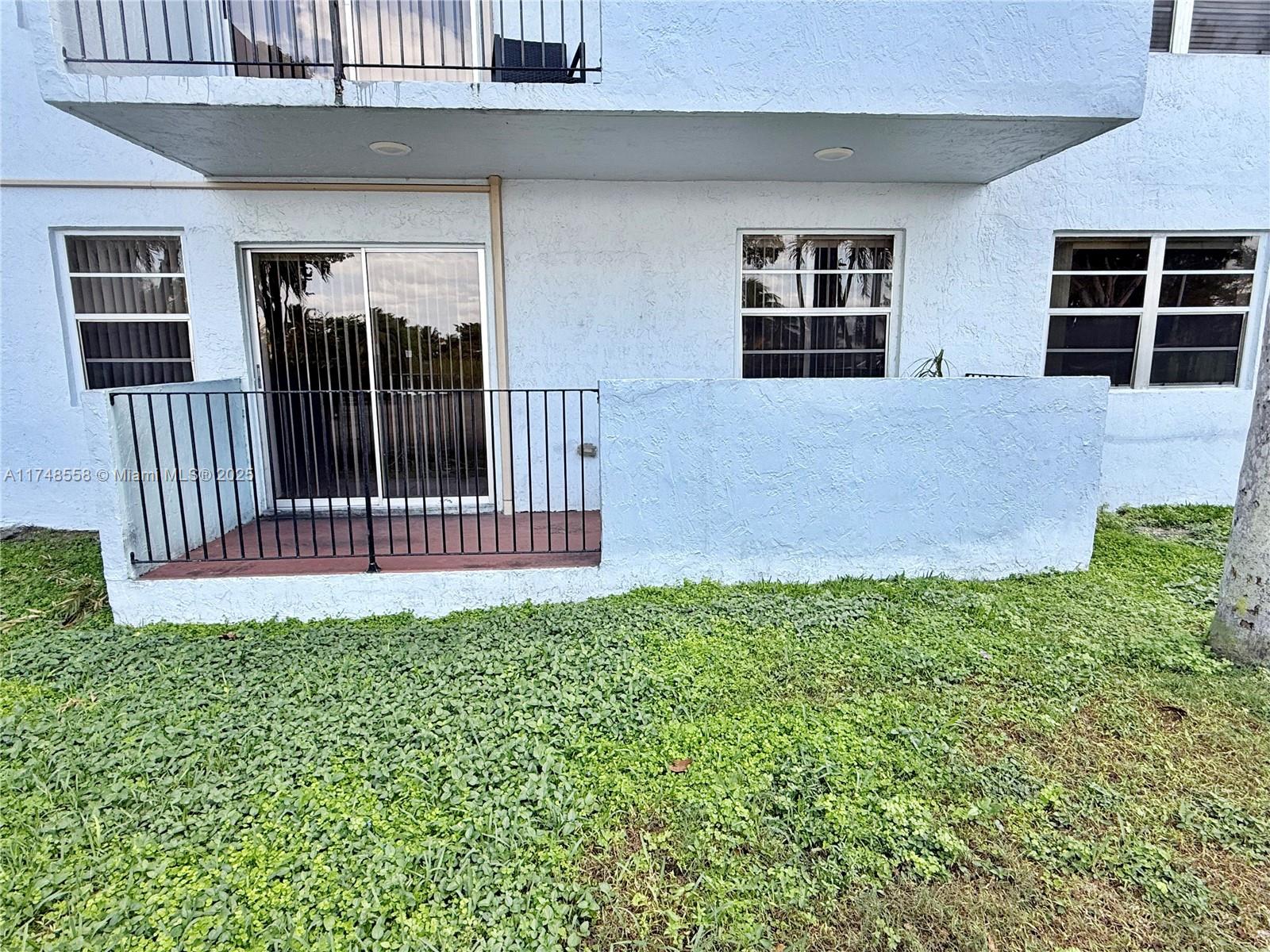 a front view of a house with balcony