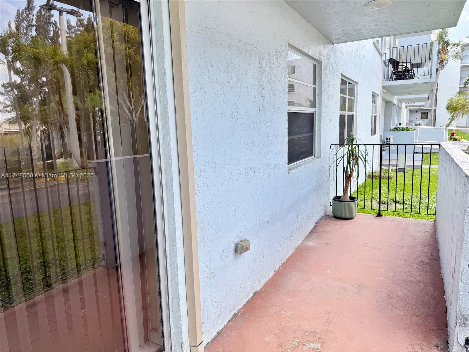 Tamiami Miami, FL 33184 - Photo 4 of 27 a view of a house with a small yard