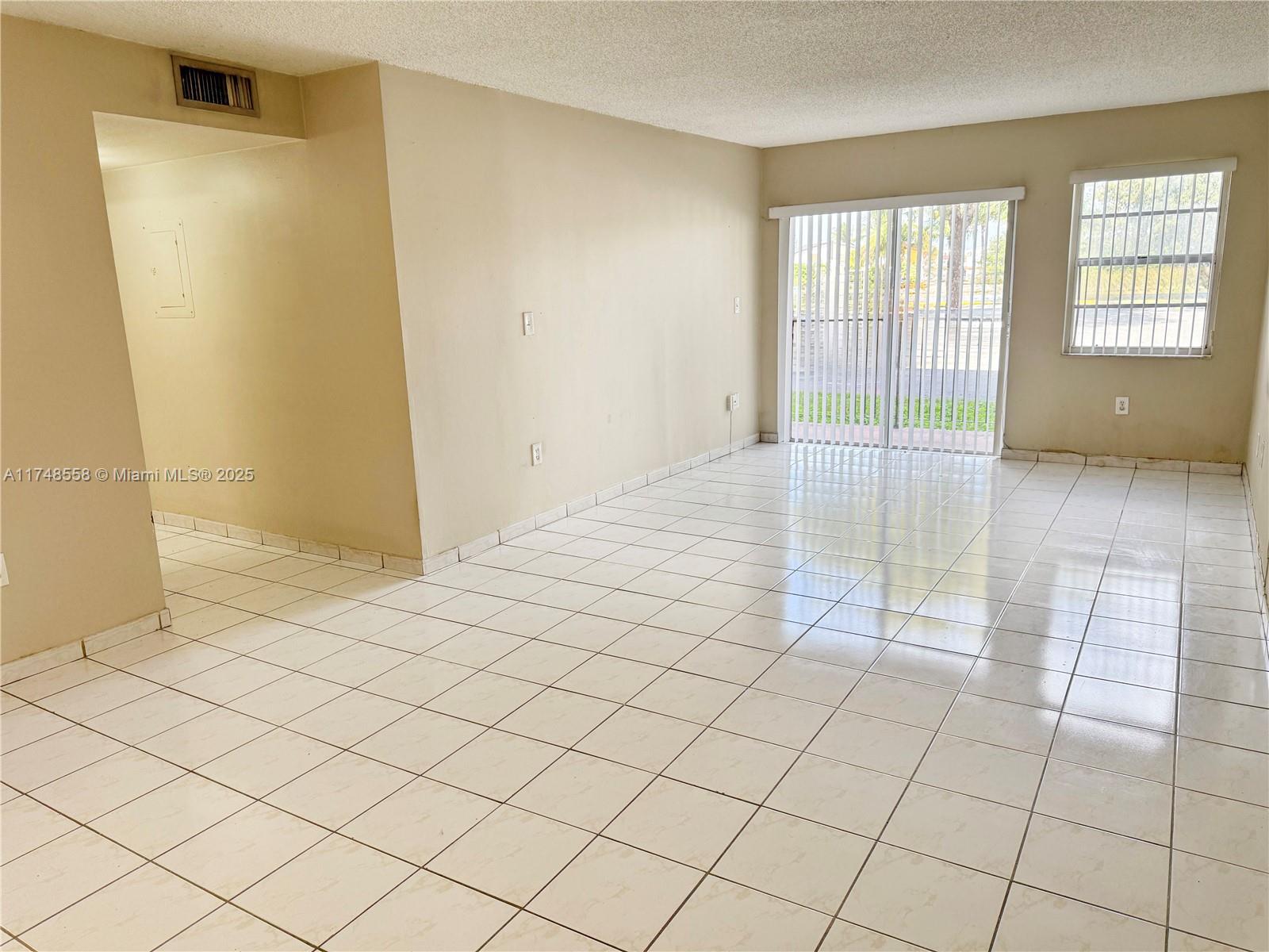 Tamiami Miami, FL 33184 - Photo 8 of 27 a view of an empty room and window