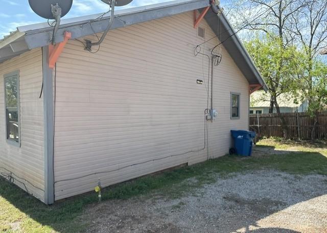 700 West 8th Street Cisco, TX 76437 - Photo 13 of 13 a view of a backyard with wooden fence