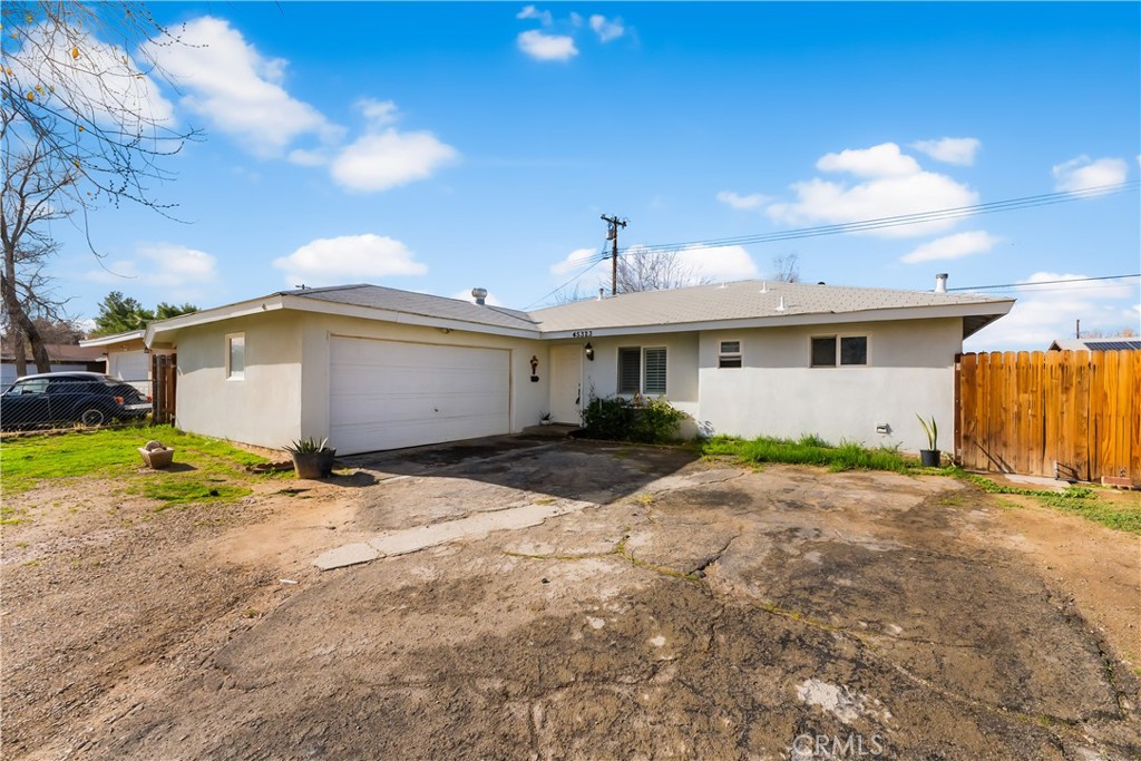 45323 Andale Avenue Lancaster, CA 93535 - Photo 2 of 29 a front view of a house with a yard
