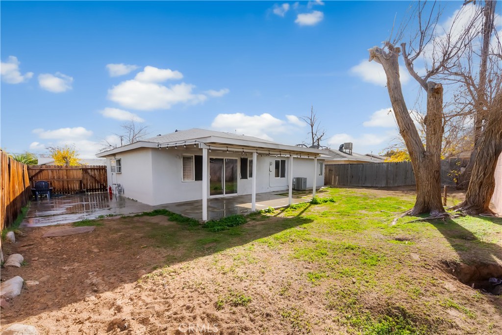 45323 Andale Avenue Lancaster, CA 93535 - Photo 27 of 29 a view of a house with backyard and sitting area