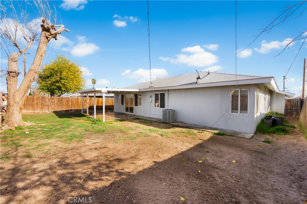 45323 Andale Avenue Lancaster, CA 93535 - Photo 29 of 29 a view of a house with backyard and garden