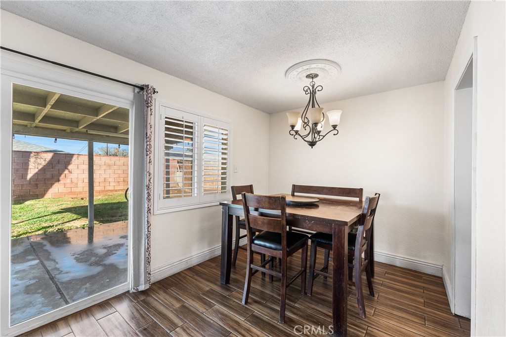 45323 Andale Avenue Lancaster, CA 93535 - Photo 10 of 29 a view of a dining room with furniture window and outside view