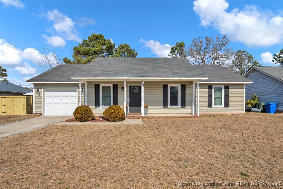 5004 Paulsun Drive Fayetteville, NC 28304 - Photo 1 of 31 front view of a house with a outdoor space