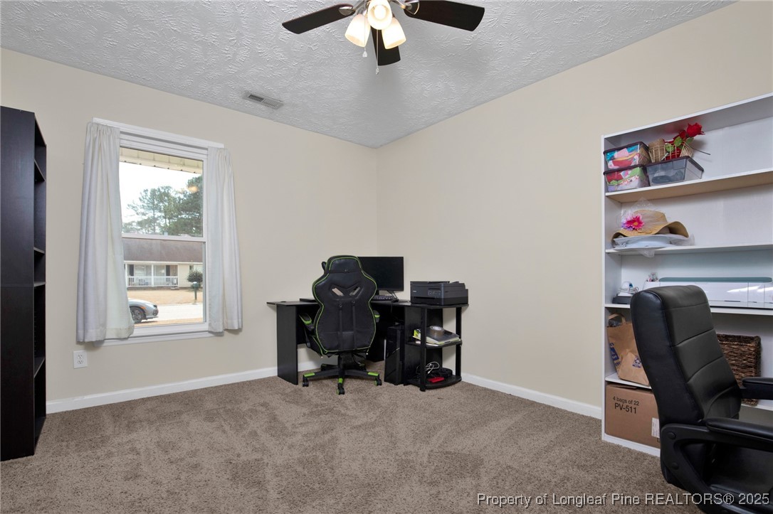 5004 Paulsun Drive Fayetteville, NC 28304 - Photo 17 of 31 a view of workspace with windows