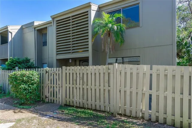 a bedroom with a bed and a view of chair