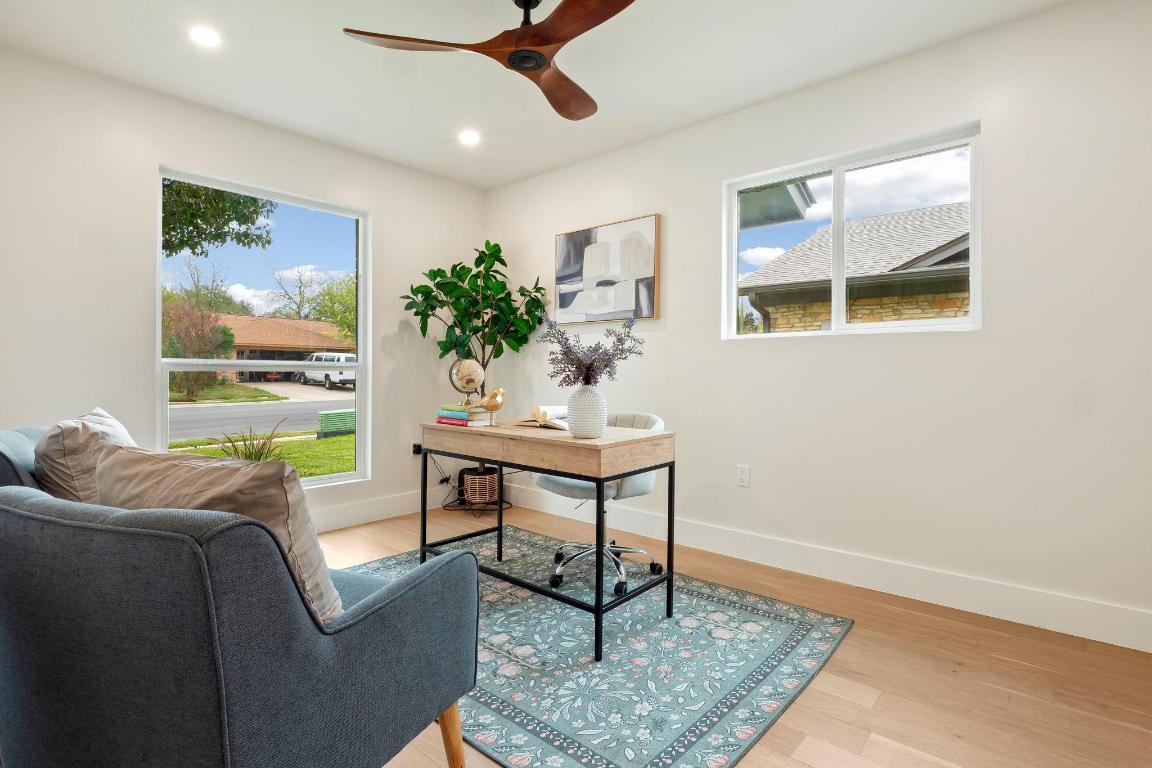 6404 Blarwood Drive Austin, TX 78745 - Photo 17 of 31 a living room with furniture and a potted plant