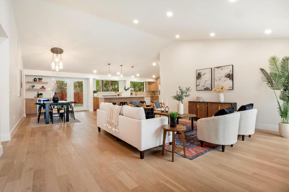 6404 Blarwood Drive Austin, TX 78745 - Photo 25 of 31 a living room with furniture and a wooden floor