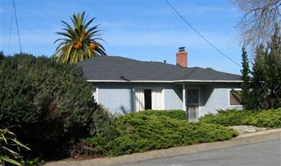 103 Garden Avenue San Rafael, CA 94903 - Photo 1 of 1 a front view of a house with a yard