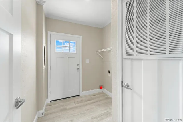 a view of a hallway with closet area