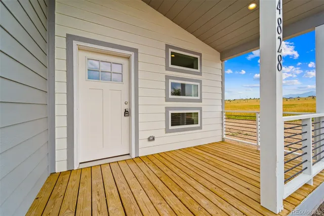 a view of a house with wooden floor
