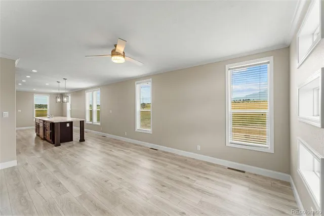 a view of livingroom with furniture and window