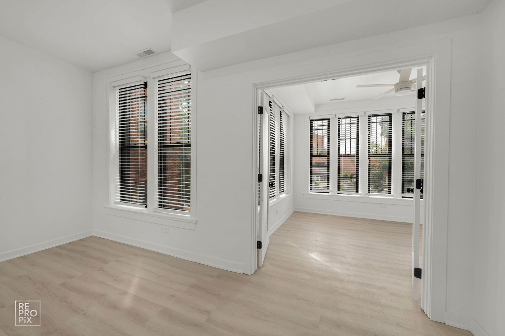 7717 North Sheridan Road, Unit 2F Chicago, IL 60626 - Photo 5 of 11 a view of an empty room with a window