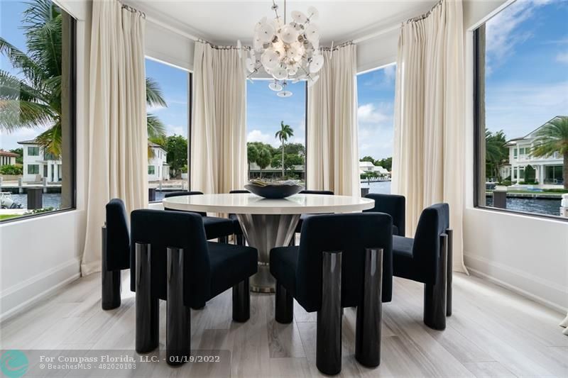 91 Compass Lane Fort Lauderdale, FL 33308 - Photo 11 of 59 a view of a dining room with furniture and window