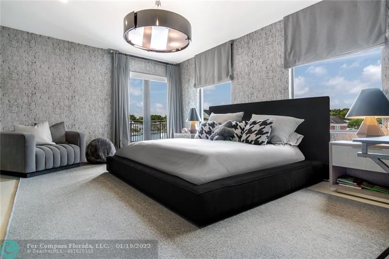 91 Compass Lane Fort Lauderdale, FL 33308 - Photo 22 of 59 a bedroom with a bed and window