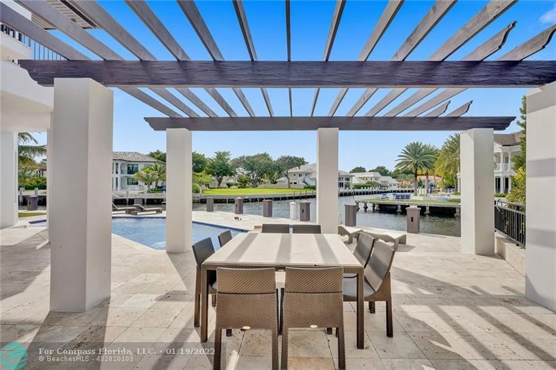 91 Compass Lane Fort Lauderdale, FL 33308 - Photo 30 of 59 a dining room with furniture window and outside view