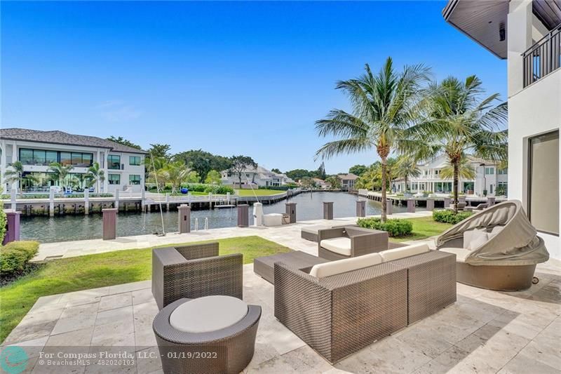 91 Compass Lane Fort Lauderdale, FL 33308 - Photo 31 of 59 a view of a swimming pool with a patio