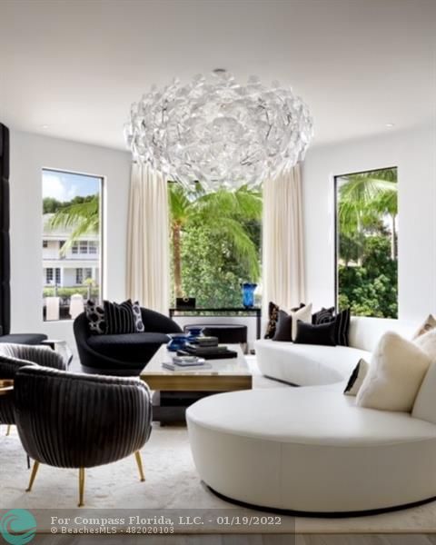 91 Compass Lane Fort Lauderdale, FL 33308 - Photo 37 of 59 a living room with furniture and a large window