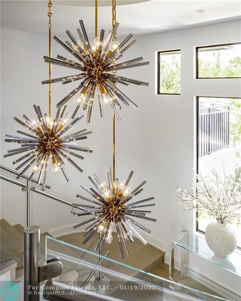 91 Compass Lane Fort Lauderdale, FL 33308 - Photo 53 of 59 a view of a livingroom with a window and wooden floor