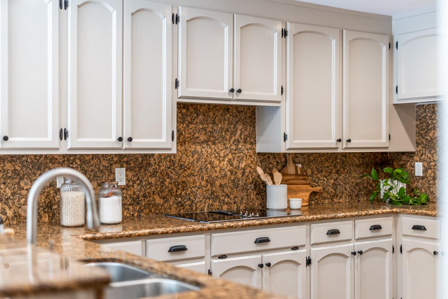 140 Echo Ridge Lane Soquel, CA 95073 - Photo 11 of 50 a kitchen with white cabinets and appliances